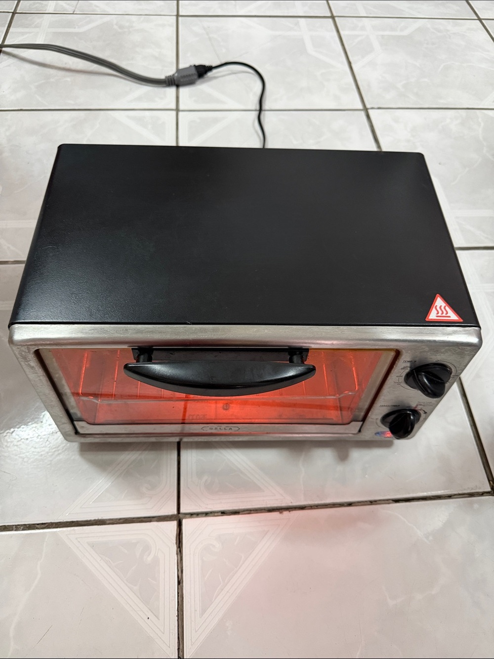Compact Black Stainless Steel Toaster Oven with Red Indicator